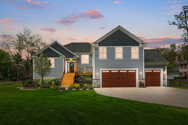 589 Quassey Ave, Lake Bluff, IL 60044 - view of front of property featuring driveway, a front yard, and stone siding