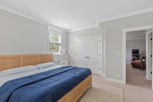 589 Quassey Ave, Lake Bluff, IL 60044 - bedroom with light carpet, a closet, ornamental molding, and baseboards