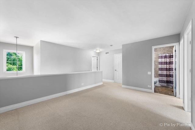 18104 Lake Shore Dr, Orland Park, IL 60467 - carpeted empty room with baseboards