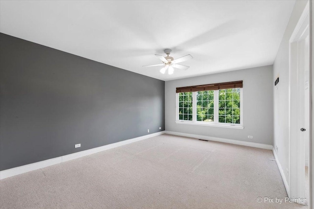 18104 Lake Shore Dr, Orland Park, IL 60467 - empty room with ceiling fan, baseboards, and carpet