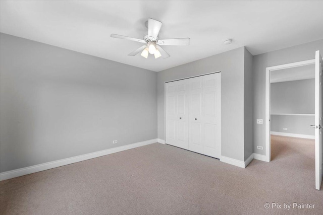 18104 Lake Shore Dr, Orland Park, IL 60467 - unfurnished bedroom featuring carpet flooring, a closet, baseboards, and ceiling fan