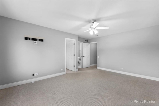 18104 Lake Shore Dr, Orland Park, IL 60467 - unfurnished bedroom with baseboards, light colored carpet, and ceiling fan