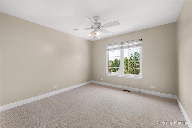 18104 Lake Shore Dr, Orland Park, IL 60467 - empty room with baseboards, ceiling fan, and light colored carpet