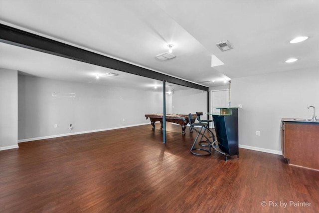 18104 Lake Shore Dr, Orland Park, IL 60467 - finished below grade area with wet bar, billiards, dark wood-style flooring, and baseboards