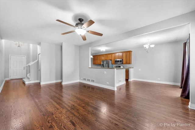 18104 Lake Shore Dr, Orland Park, IL 60467 - unfurnished living room with a chandelier, a ceiling fan, dark wood finished floors, and baseboards