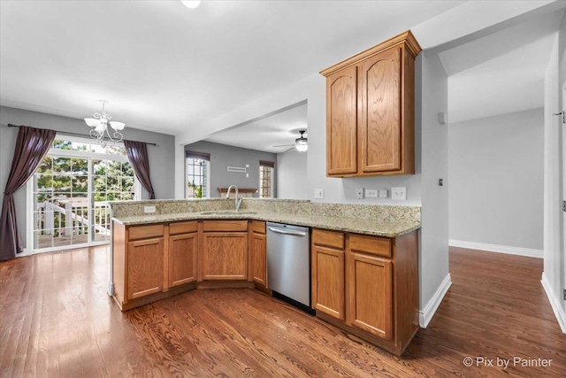 18104 Lake Shore Dr, Orland Park, IL 60467 - kitchen featuring dishwasher, a sink, a peninsula, and dark wood-style flooring