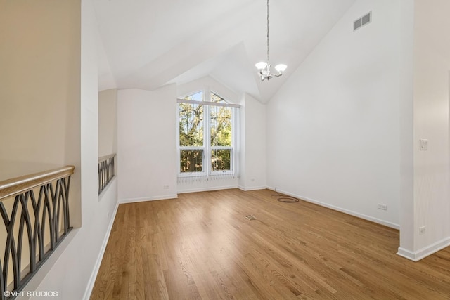 3305 Old Glenview Rd Unit A, Wilmette, IL 60091 - bonus room with wood finished floors, a chandelier, baseboards, and lofted ceiling