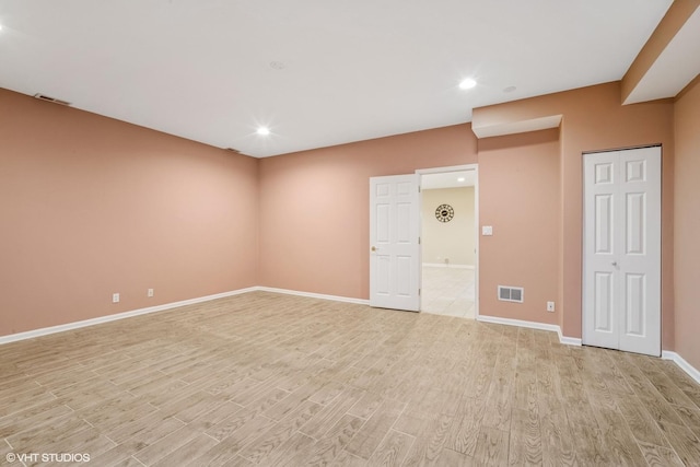 3305 Old Glenview Rd Unit A, Wilmette, IL 60091 - spare room with light wood finished floors, baseboards, and recessed lighting