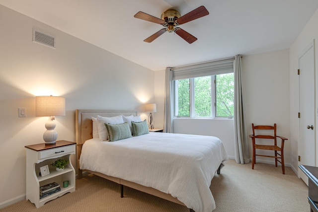 1111 S Waukegan Rd Unit 10, Lake Forest, IL 60045 - bedroom with light colored carpet, baseboards, and ceiling fan