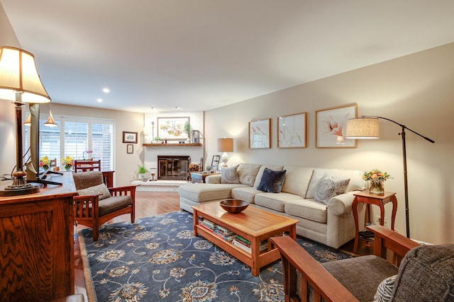 1111 S Waukegan Rd Unit 10, Lake Forest, IL 60045 - living room with wood finished floors, a glass covered fireplace, and recessed lighting