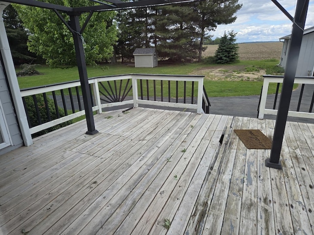 1988 S Chana Rd, Chana, IL 61015 - wooden deck featuring a yard