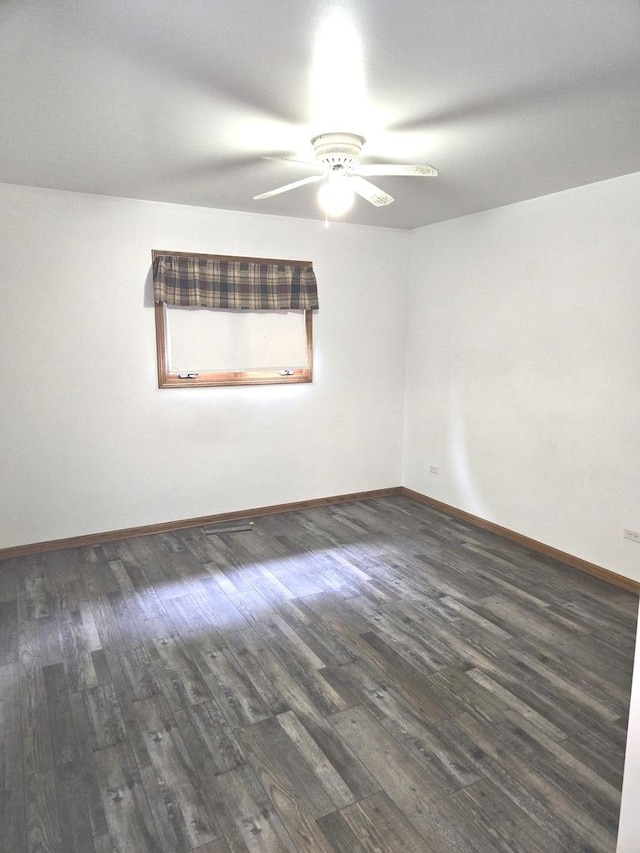1988 S Chana Rd, Chana, IL 61015 - unfurnished room featuring ceiling fan, wood finished floors, and baseboards