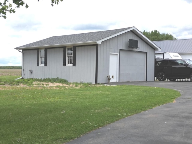 1988 S Chana Rd, Chana, IL 61015 - detached garage featuring driveway