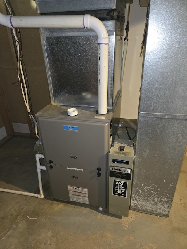 1988 S Chana Rd, Chana, IL 61015 - utility room with heating unit