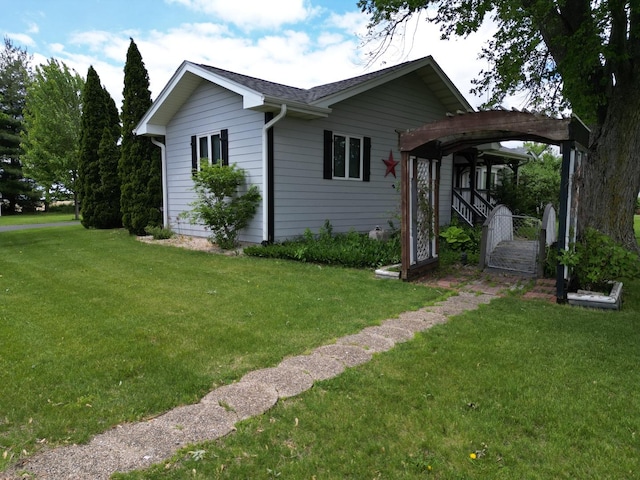 1988 S Chana Rd, Chana, IL 61015 - view of property exterior with a lawn