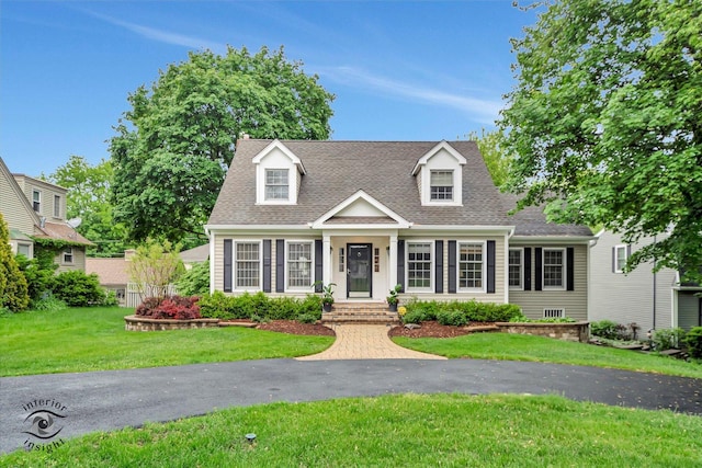 616 E Hillside Ave, Barrington, IL 60010 - cape cod-style house with a shingled roof and a front lawn