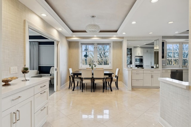 dining area featuring baseboards, light tile patterned floors, a raised ceiling, and recessed lighting