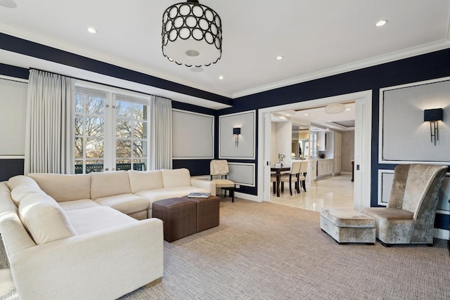 living area with crown molding, light colored carpet, and recessed lighting