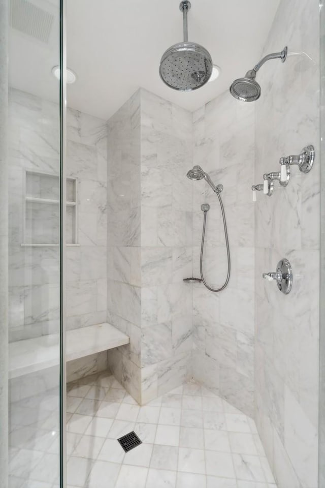 full bath featuring a shower stall
