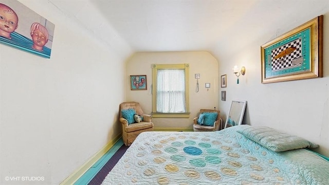 1655 N Francisco Ave, Chicago, IL 60647 - bedroom with lofted ceiling and wood finished floors