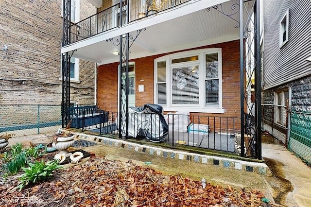 1655 N Francisco Ave, Chicago, IL 60647 - view of exterior entry with brick siding and covered porch