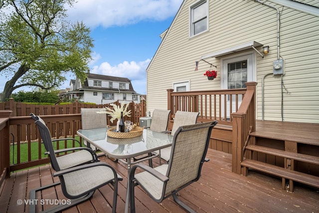 4101 N Ozark Ave, Norridge, IL 60706 - wooden deck with outdoor dining area and cooling unit