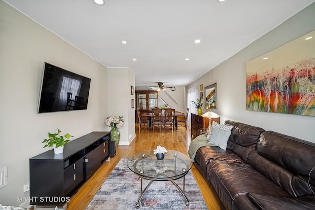 4101 N Ozark Ave, Norridge, IL 60706 - living area with light wood-style floors, recessed lighting, a ceiling fan, and baseboards