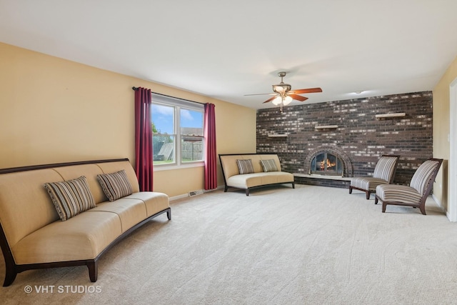 12809 W Meadowview Ln, Homer Glen, IL 60491 - living area with ceiling fan, carpet, baseboards, and a brick fireplace
