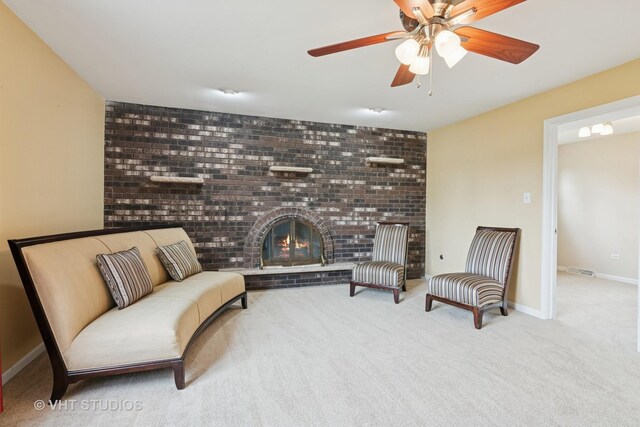 12809 W Meadowview Ln, Homer Glen, IL 60491 - living area with a brick fireplace, carpet, a ceiling fan, and baseboards