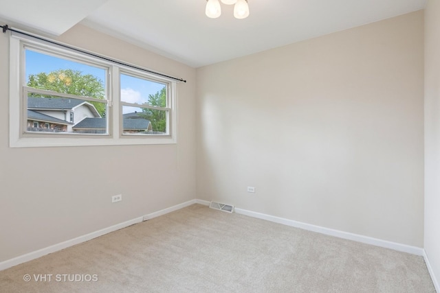 12809 W Meadowview Ln, Homer Glen, IL 60491 - carpeted spare room featuring baseboards