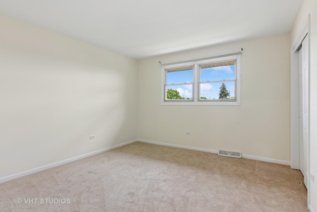 12809 W Meadowview Ln, Homer Glen, IL 60491 - unfurnished bedroom featuring carpet, baseboards, and a closet