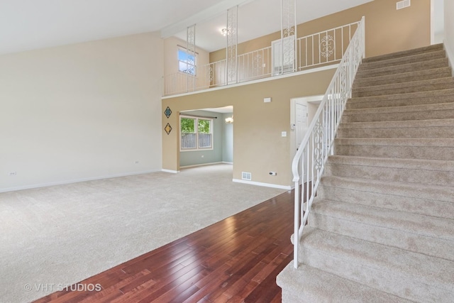 12809 W Meadowview Ln, Homer Glen, IL 60491 - stairway featuring hardwood / wood-style floors, baseboards, high vaulted ceiling, carpet floors, and beamed ceiling