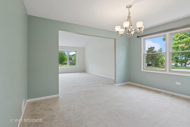 12809 W Meadowview Ln, Homer Glen, IL 60491 - carpeted spare room featuring a chandelier and baseboards