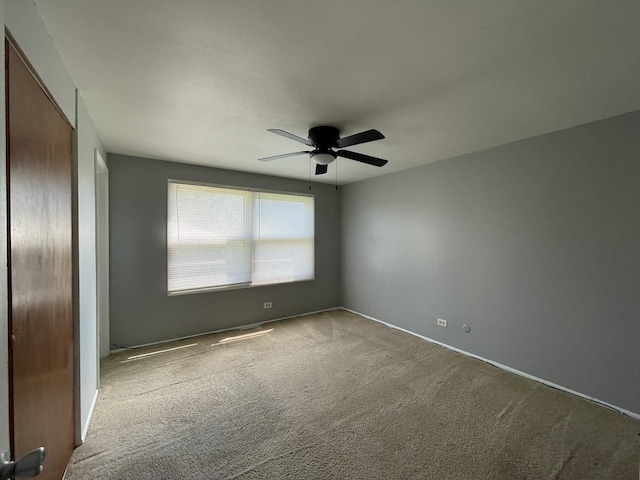 235 Lexington Dr, Bolingbrook, IL 60440 - unfurnished room with carpet flooring and a ceiling fan