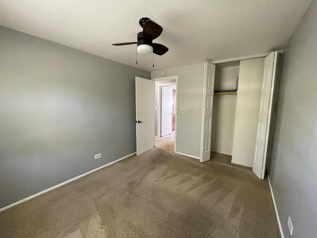 235 Lexington Dr, Bolingbrook, IL 60440 - unfurnished bedroom featuring a closet, carpet flooring, baseboards, and a ceiling fan