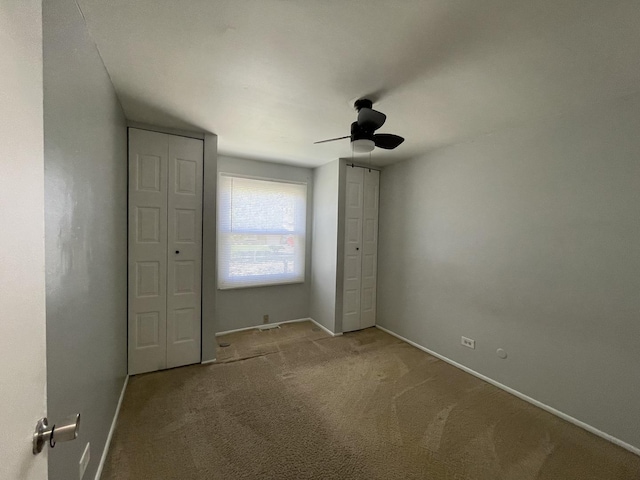 235 Lexington Dr, Bolingbrook, IL 60440 - unfurnished bedroom with baseboards, carpet floors, and a ceiling fan