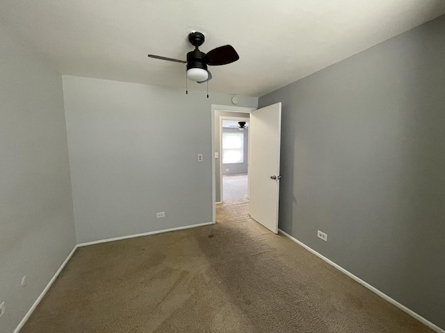 235 Lexington Dr, Bolingbrook, IL 60440 - carpeted empty room with ceiling fan and baseboards