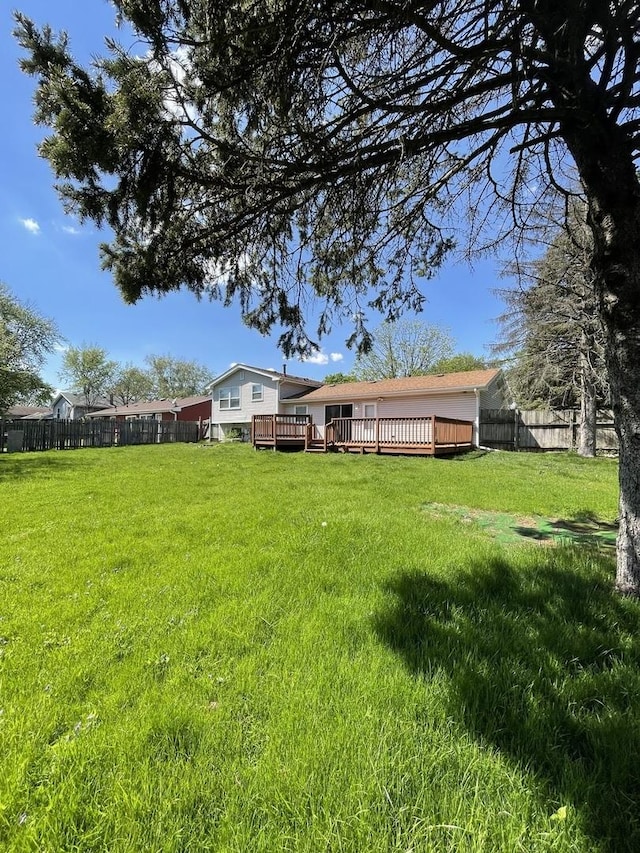 235 Lexington Dr, Bolingbrook, IL 60440 - view of yard featuring a deck
