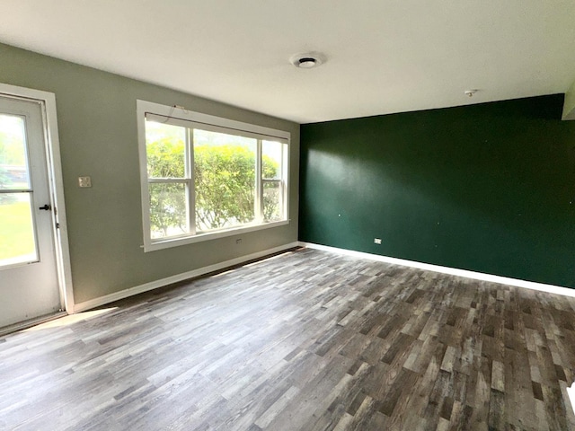 120 E 15th St, Lombard, IL 60148 - unfurnished room featuring wood finished floors and baseboards
