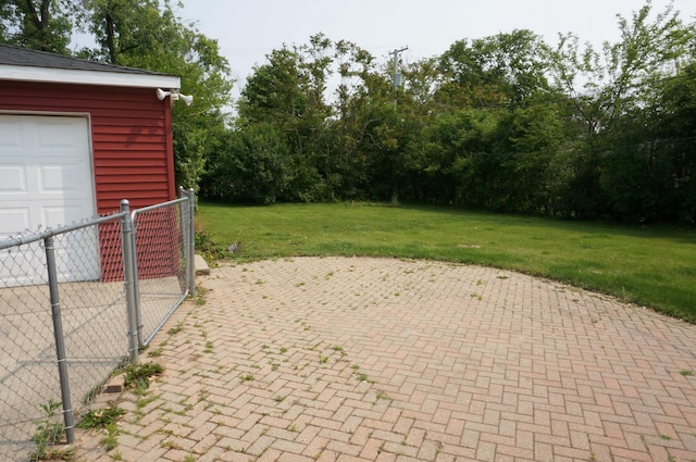 120 E 15th St, Lombard, IL 60148 - view of patio featuring a garage