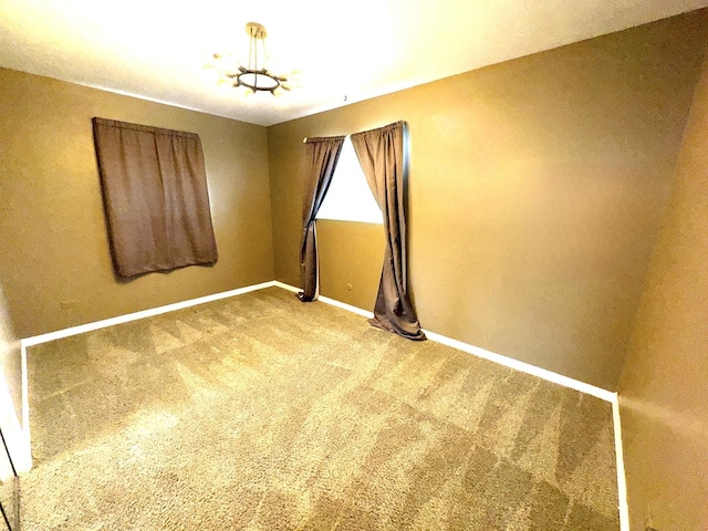 120 E 15th St, Lombard, IL 60148 - spare room featuring a chandelier, baseboards, and carpet flooring