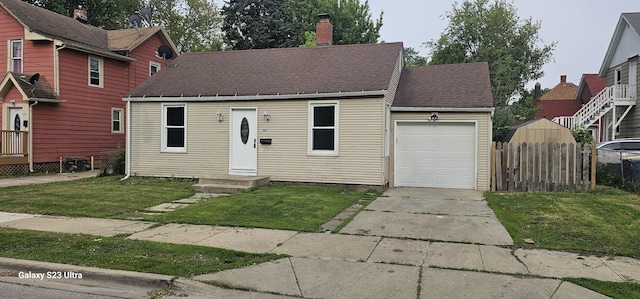 307 Bevier Pl, Aurora, IL 60505 - view of front of home featuring concrete driveway, an attached garage, a chimney, and roof with shingles