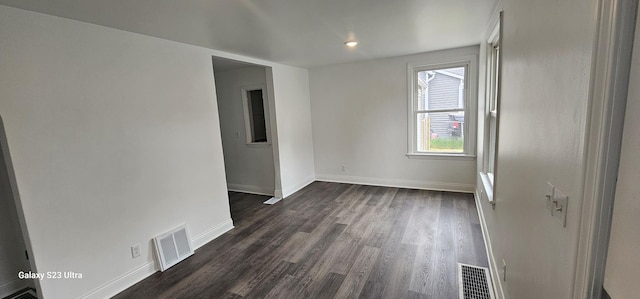 307 Bevier Pl, Aurora, IL 60505 - unfurnished room featuring dark wood finished floors, baseboards, and recessed lighting