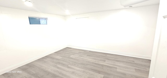 307 Bevier Pl, Aurora, IL 60505 - spare room with wood finished floors and baseboards