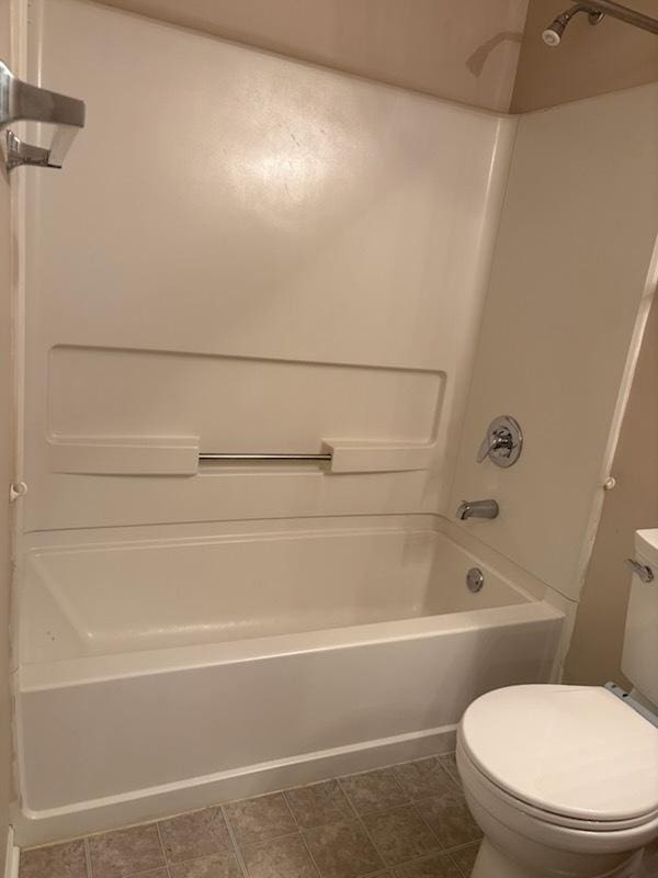 1127 N Red Oak Cir Unit 2, Round Lake Beach, IL 60073 - bathroom featuring toilet and bathing tub / shower combination