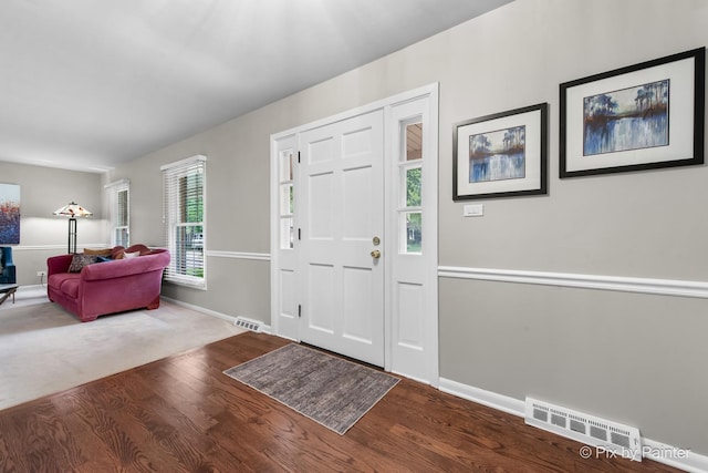 570 E Carpenter Dr, Palatine, IL 60074 - entrance foyer with baseboards and wood finished floors