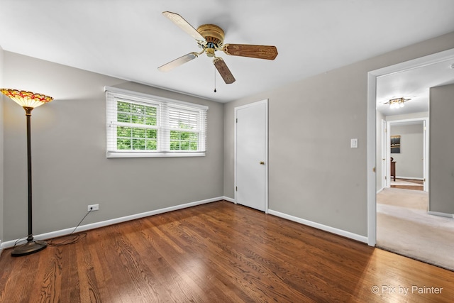 570 E Carpenter Dr, Palatine, IL 60074 - unfurnished bedroom with wood finished floors and a ceiling fan