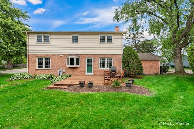 570 E Carpenter Dr, Palatine, IL 60074 - back of house featuring brick siding, a chimney, a lawn, and a patio area