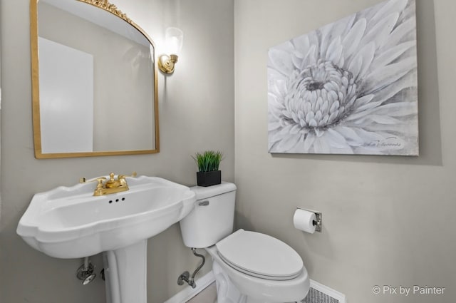 570 E Carpenter Dr, Palatine, IL 60074 - half bathroom with toilet and baseboards