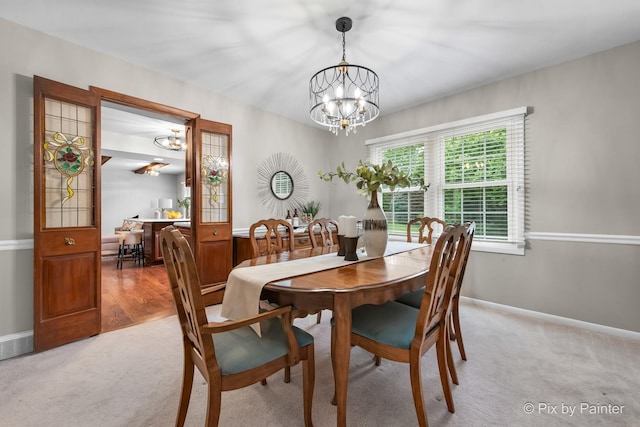 570 E Carpenter Dr, Palatine, IL 60074 - dining space featuring a chandelier and light colored carpet